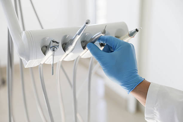 Professional Tooth Extraction technician working in Cherry Valley, IL